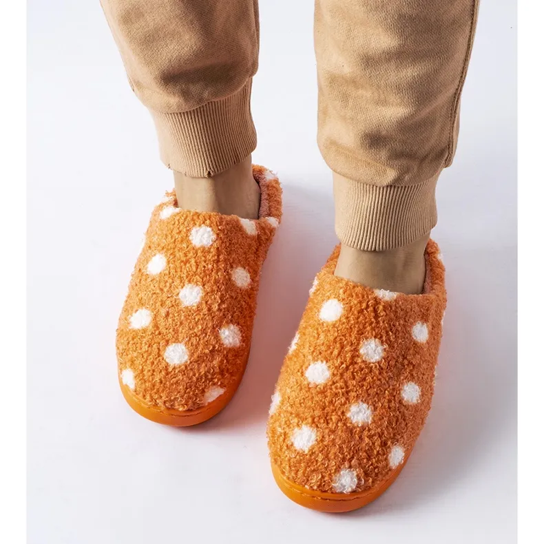 Orange warm slippers with white dots